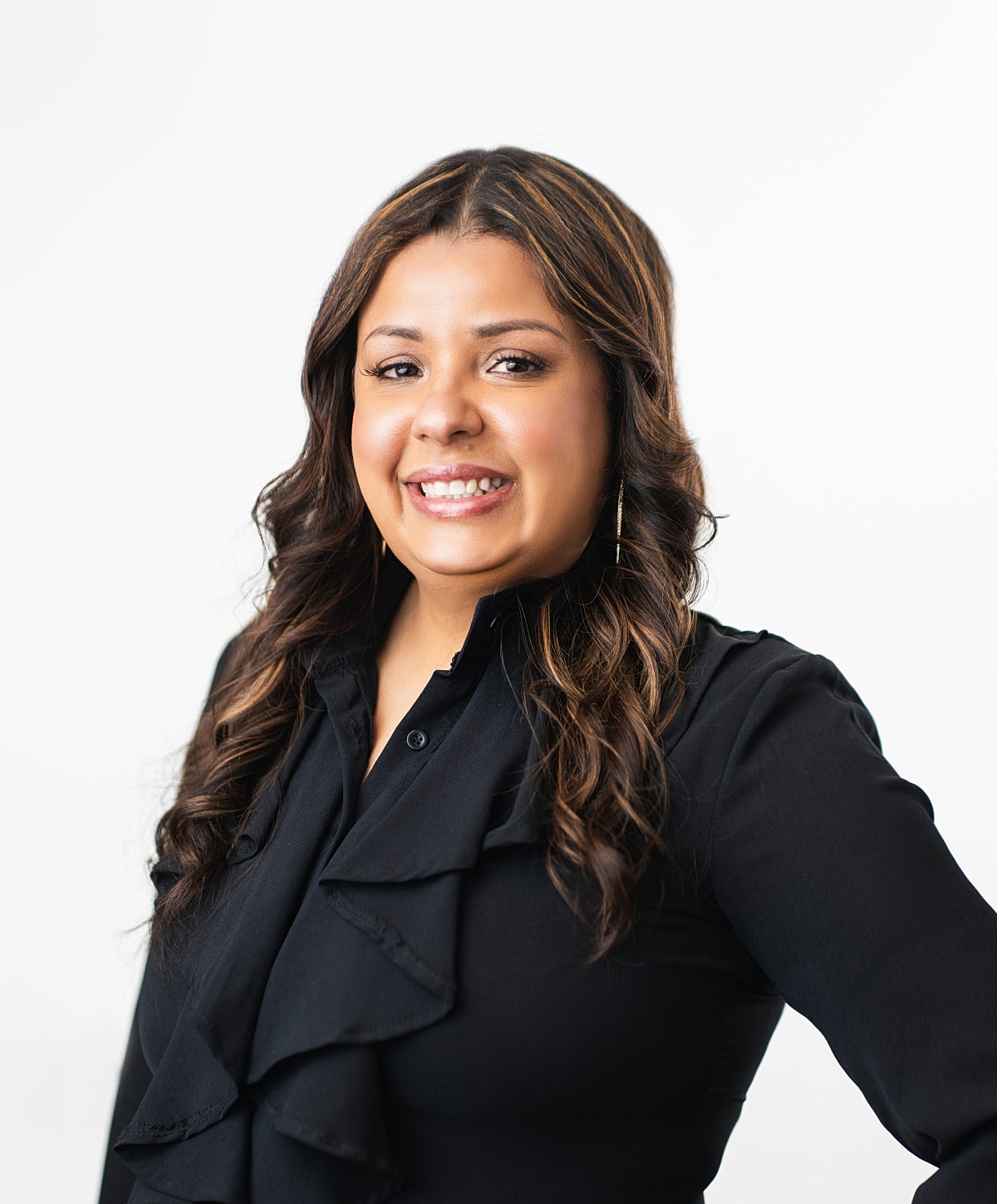 Smiling woman in a black blouse portrait.