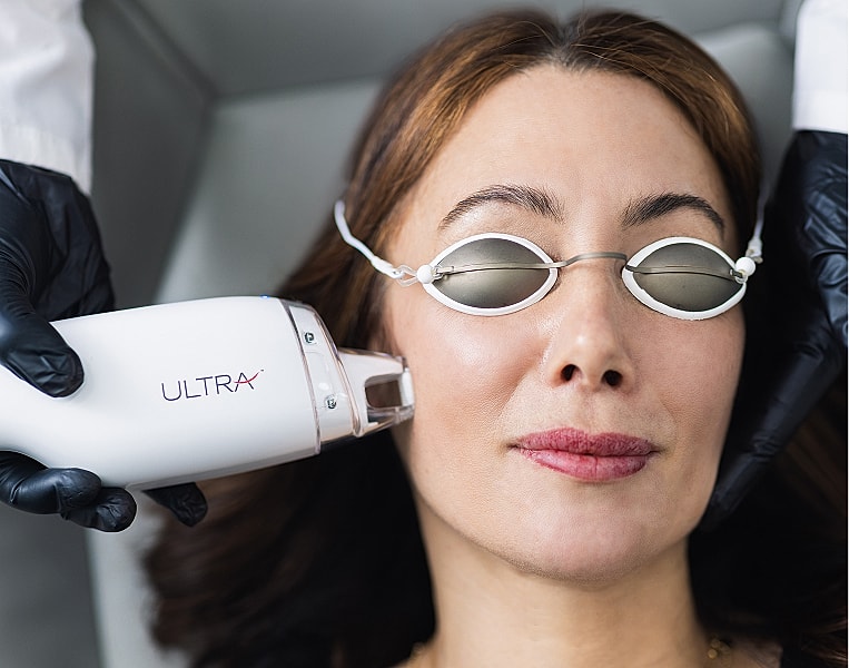 Paramus facial treatment with laser device in progress.