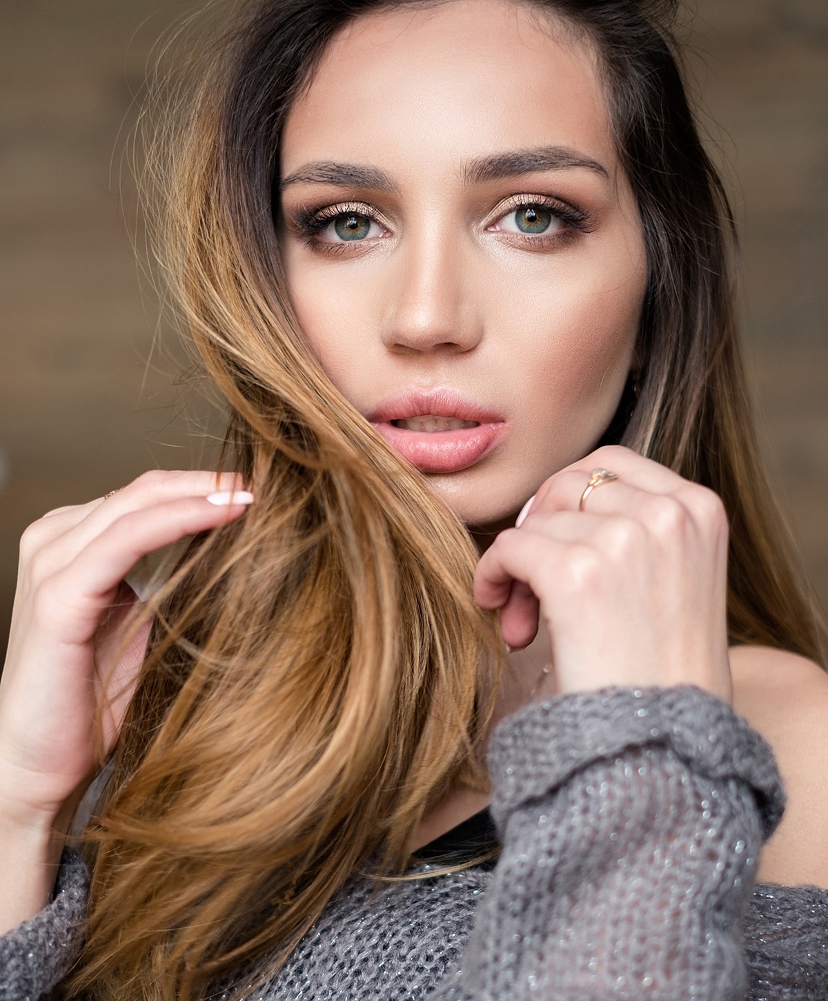 Close-up of a woman with flowing hair.